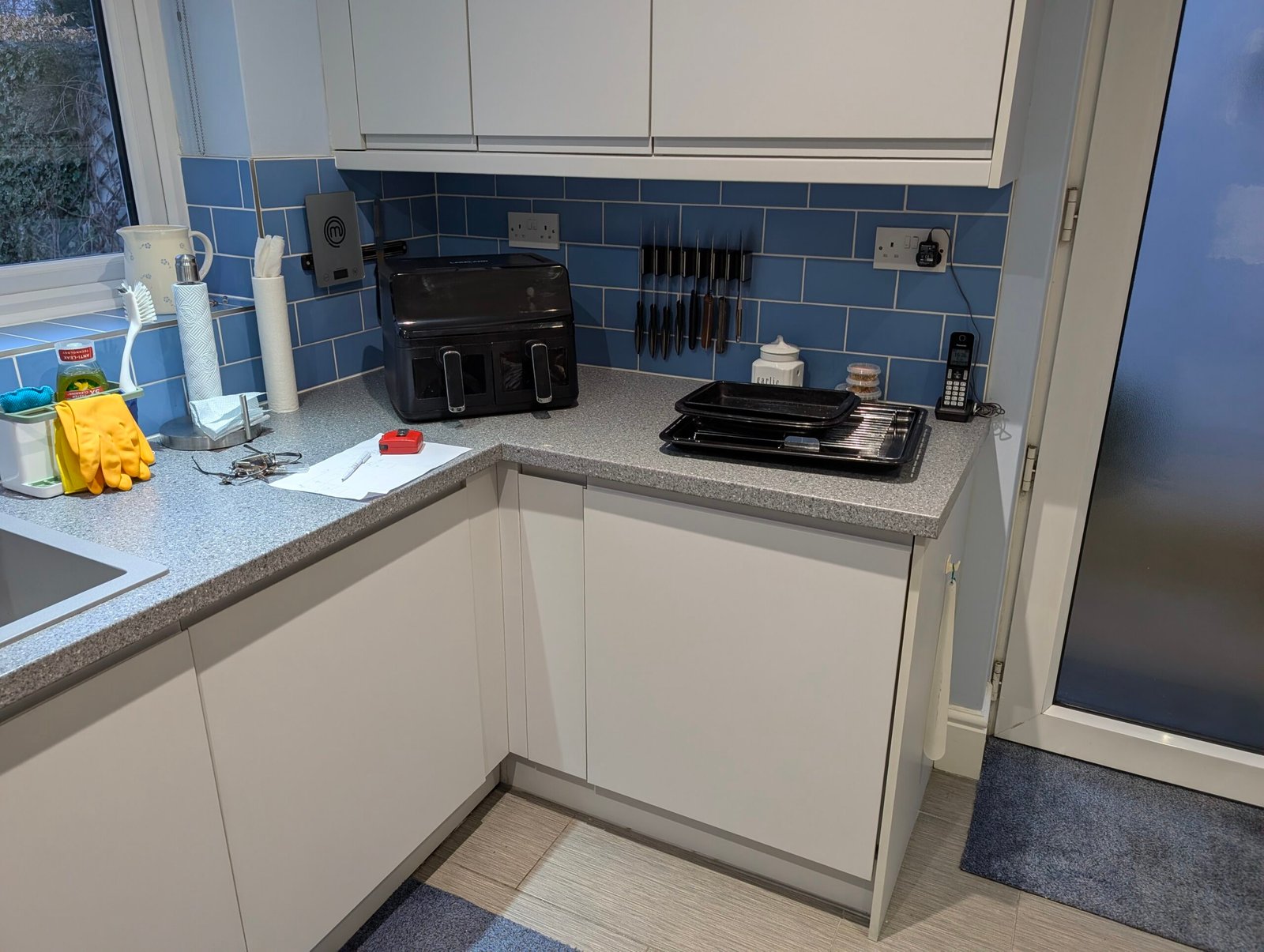 Before: corner run with speckled grey laminate