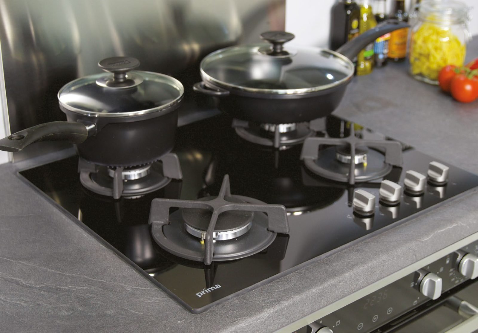 Gas on glass hob with pans